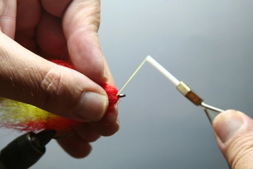 Step 12 - thread to the eye Step 12 - thread to the eye