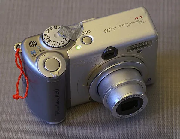 Close to perfect - This Canon P&S has been close to perfect as a fishing companion. It's rugged, good quality, lots of control and all at a sensible price. Cameras in this group give the most bang for the buck for the angler in my eyes.
The duct tape keeps the dial from turning when I take the camera out from inside my waders.